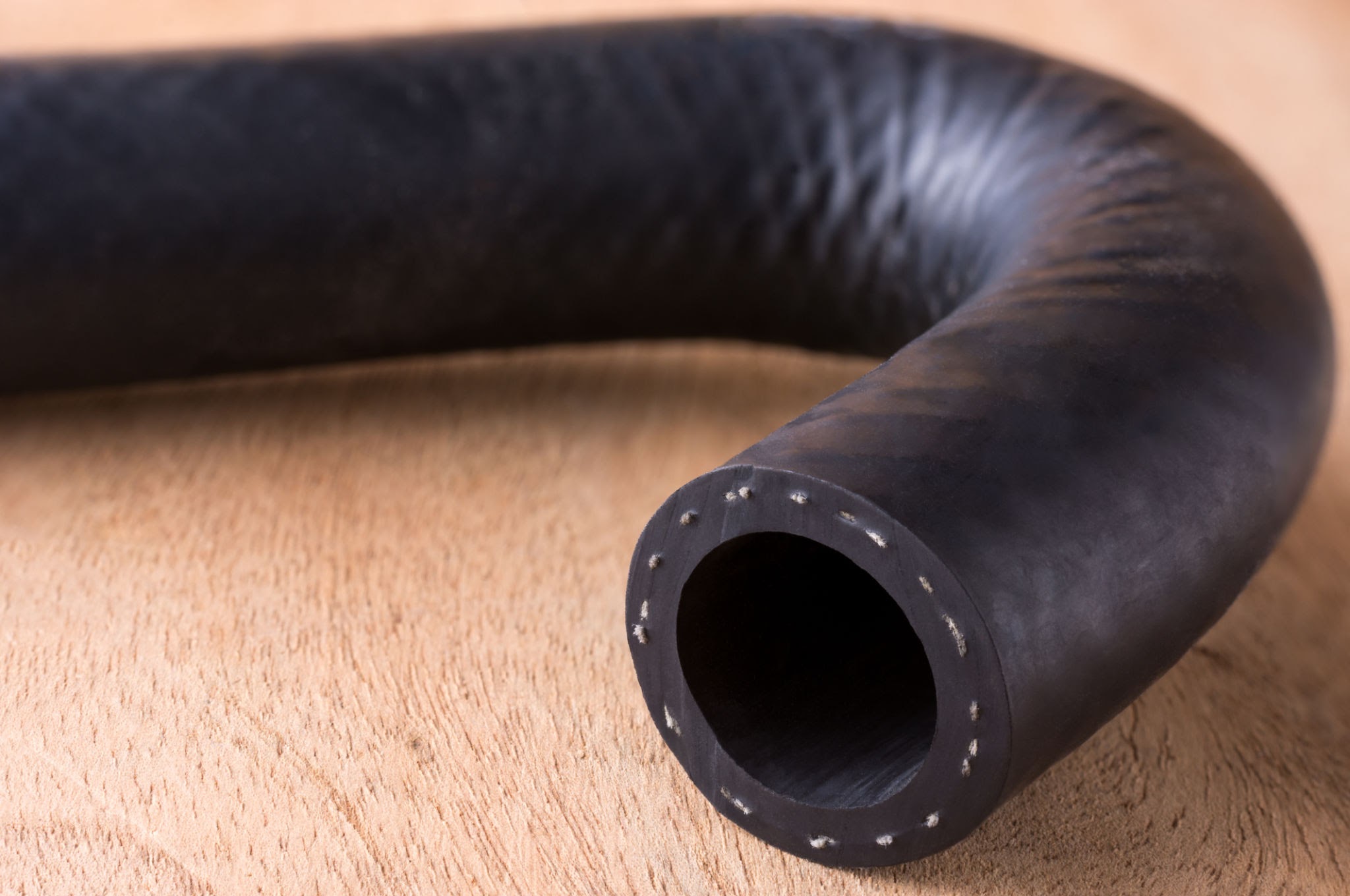 Rubber hose reinforcement cross section